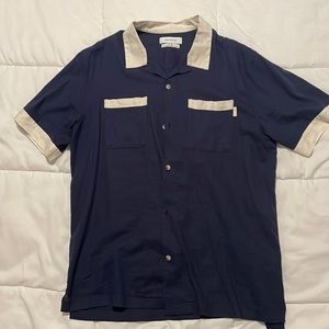 Navy blue Hawaiian/ Bowling style.